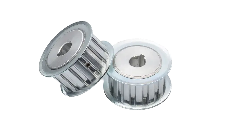 Toothed pulleys for belt drive systems
