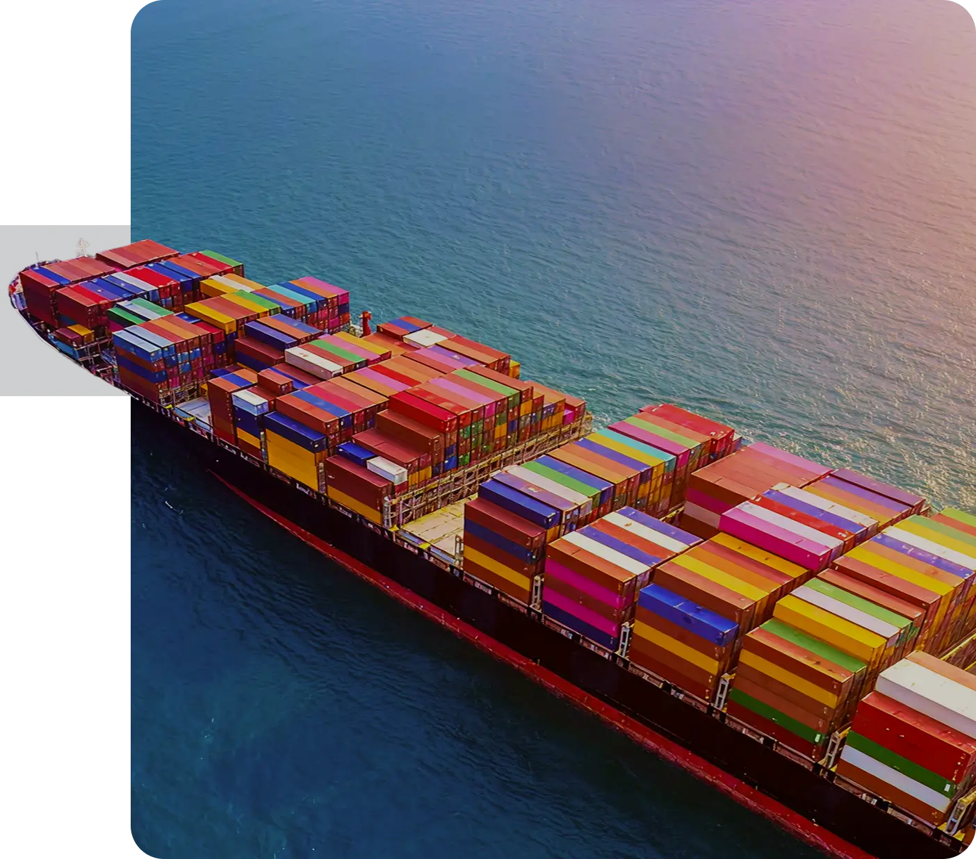 Aerial view of container ship representing TechGen Global logistics