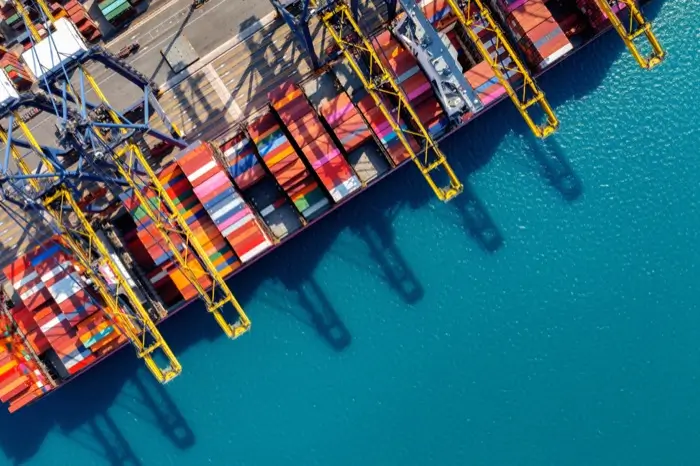 Aerial view of shipping port with containers